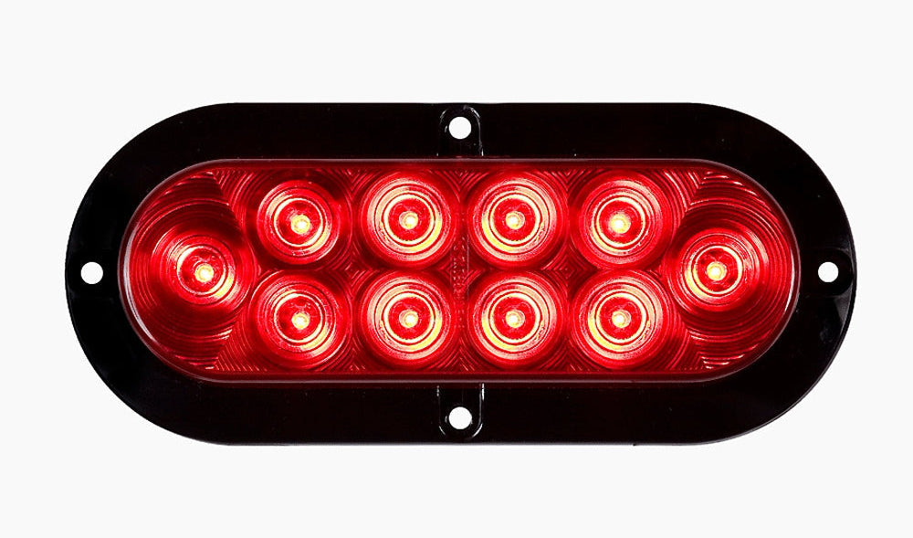 Bright red 6-inch LED stop, tail, and turn light designed for motor vehicles. The light is engineered for long-lasting illumination and is perfect for signaling, offering improved visibility and safety with efficient LED technology.