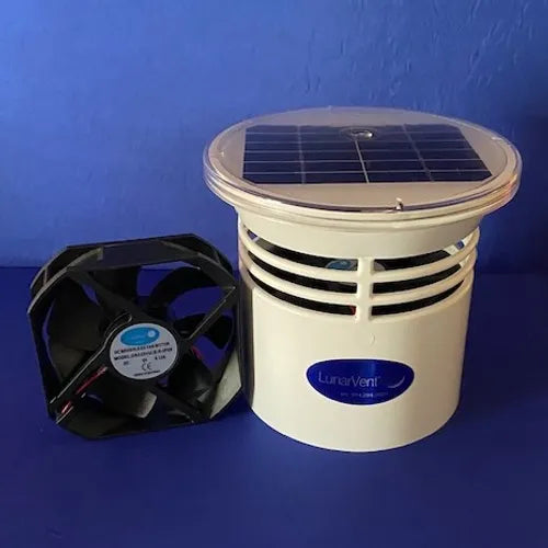 Circular black plastic cap with a small built-in solar panel on the top. The cap fits over a waste tank vent and contains a small fan powered by sunlight. It helps vent odors from the tank without the need for chemicals or electrical wiring.